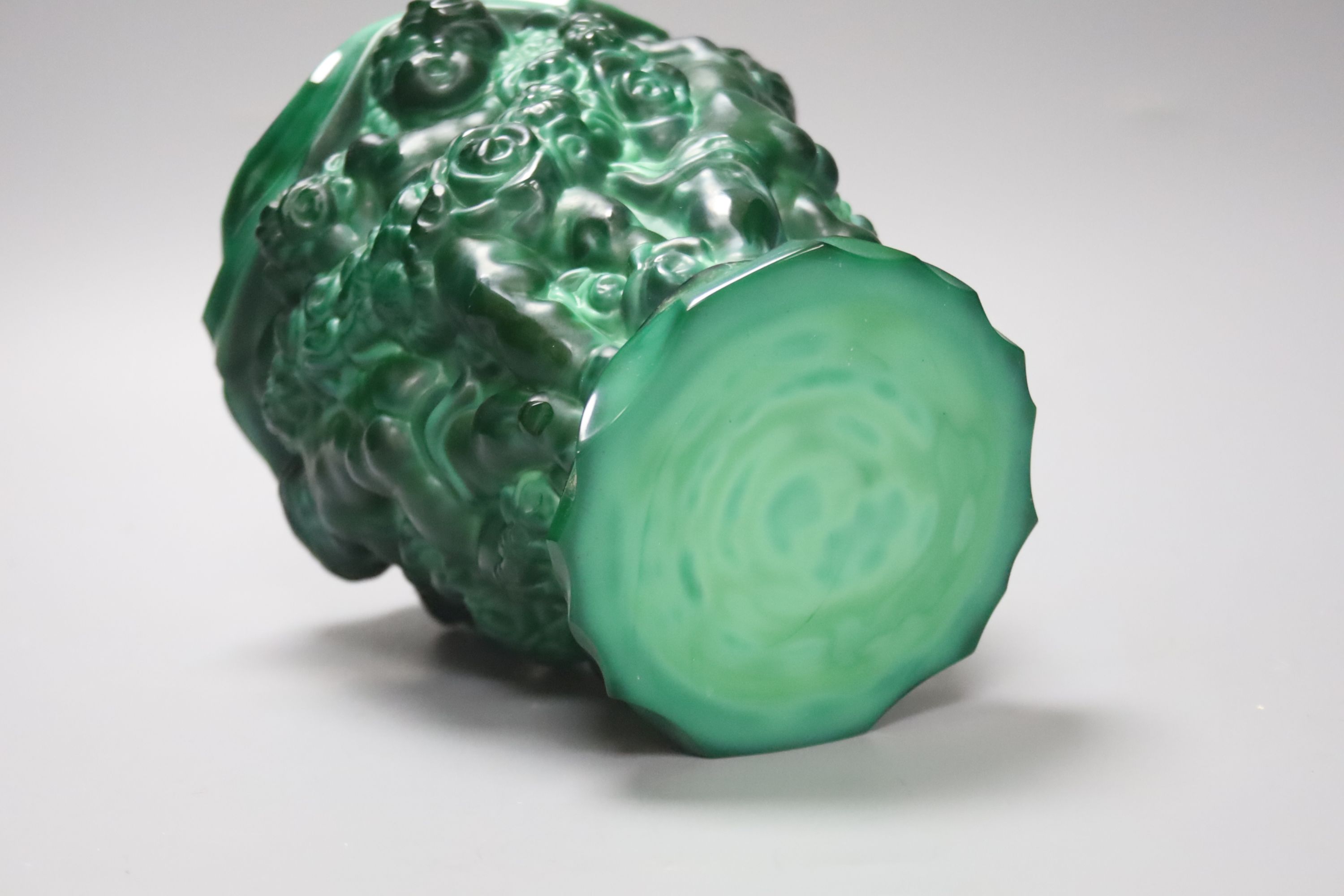 A Czech malachite glass vase with cherubs designed for Schlevogt, c.1920, height 19cm